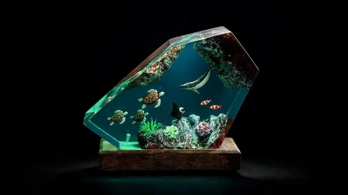 Finished resin lamp with an ocean scene resting on a wooden base